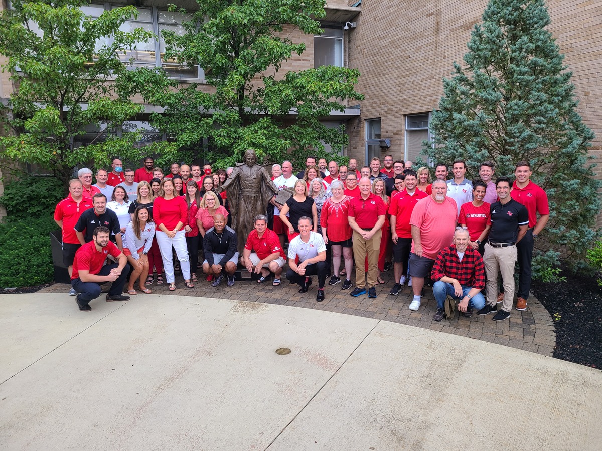 La Salle staff members in courtyard